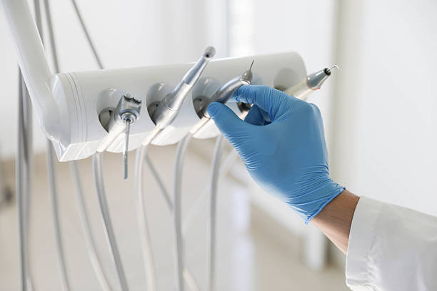 Professional Tooth Extraction technician working in New Hempstead, NY